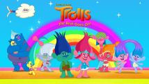 Colourful animated alien like figures posing in front of a rainbow 